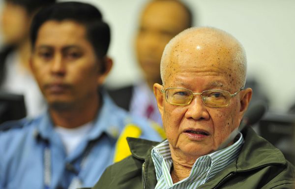 W 1976 Khieu Samphan, członek partyzantki Czerwonych Khmerów, objął w nowym państwie funkcję prezydenta. W 2007 roku został aresztowany pod zarzutami zbrodni przeciw ludzkości. Za ludobójstwo został w 2014 roku skazany na dożywotnie więzienie.